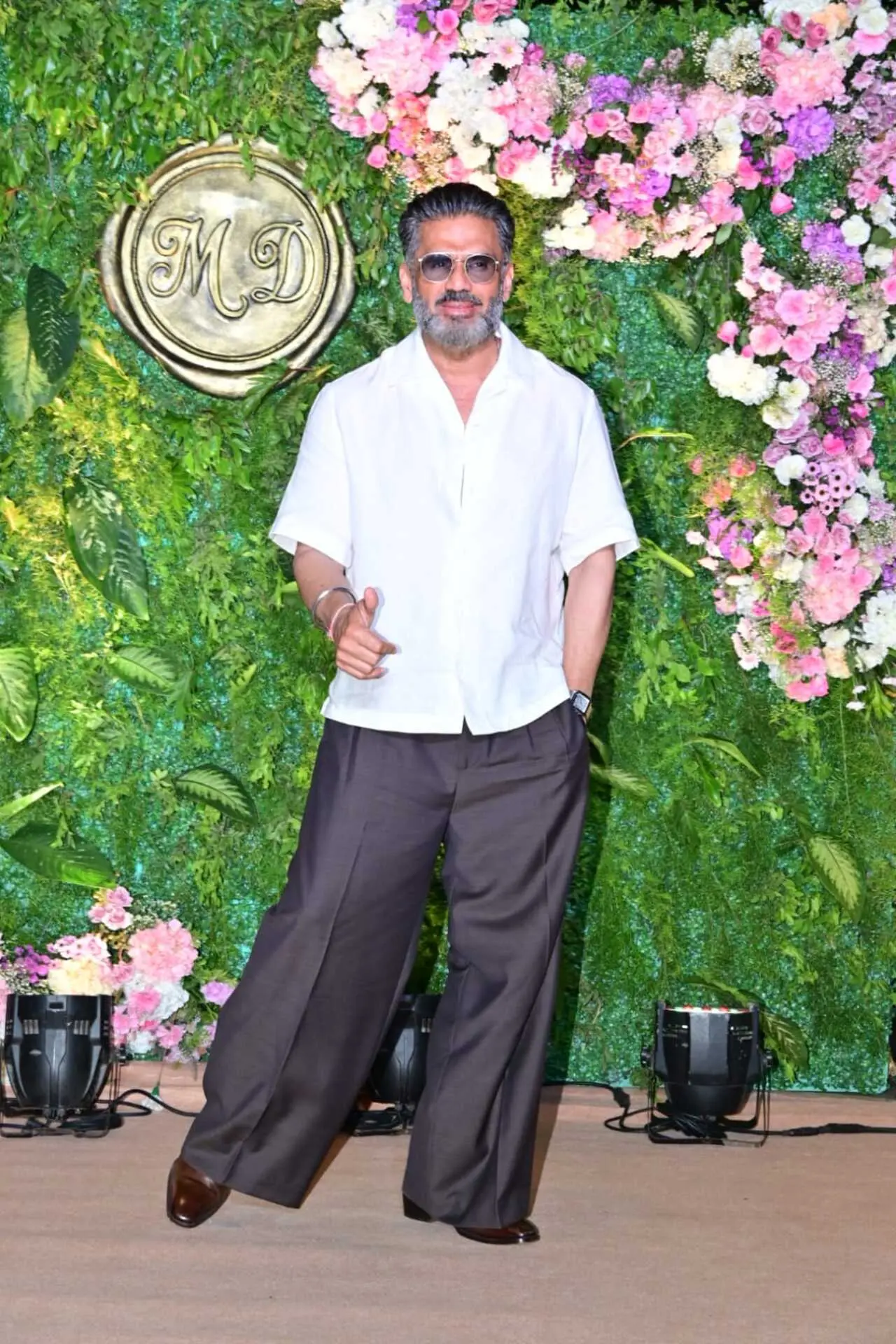 Suniel Shetty kept his look classic and understated as he attended the event in a crisp white shirt paired with tailored grey pants.